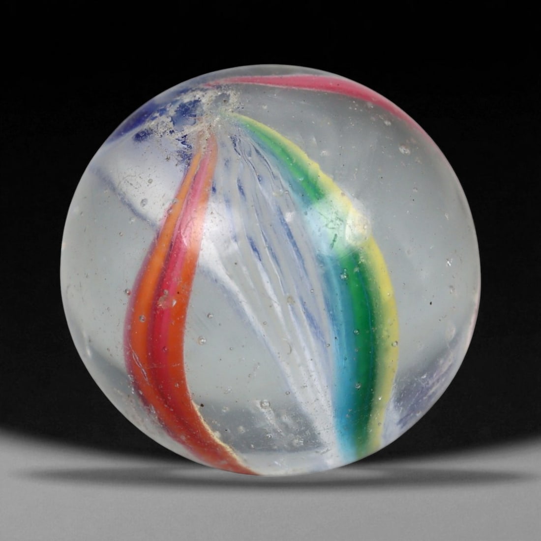 Vintage German Handmade Glass Swirl Marble, c. Early-Mid 20th Century, 14 mm: This vintage German handmade glass marble represents the golden era of European glass artistry, where precision craftsmanship and vibrant color blending elevated even simple play objects into collecti