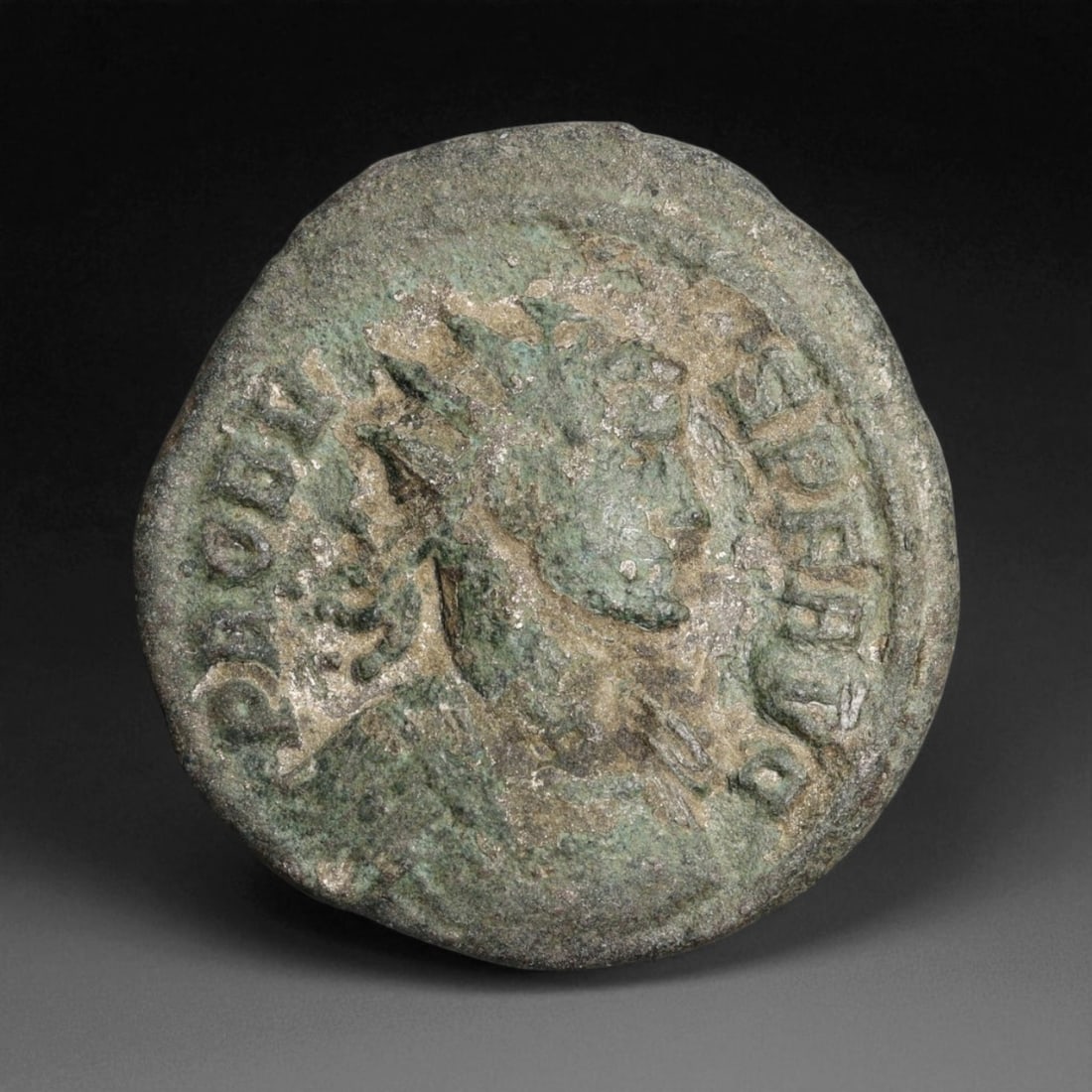 ROMAN EMPIRE: Imperial Authority - Bronze Coin, c. 1st-3rd Century AD, 21mm: Struck during the turbulent decades of the later Roman Empire, this 19mm bronze coin reflects the enduring symbolism of imperial control amidst crisis. Its compact yet deliberate design likely feature
