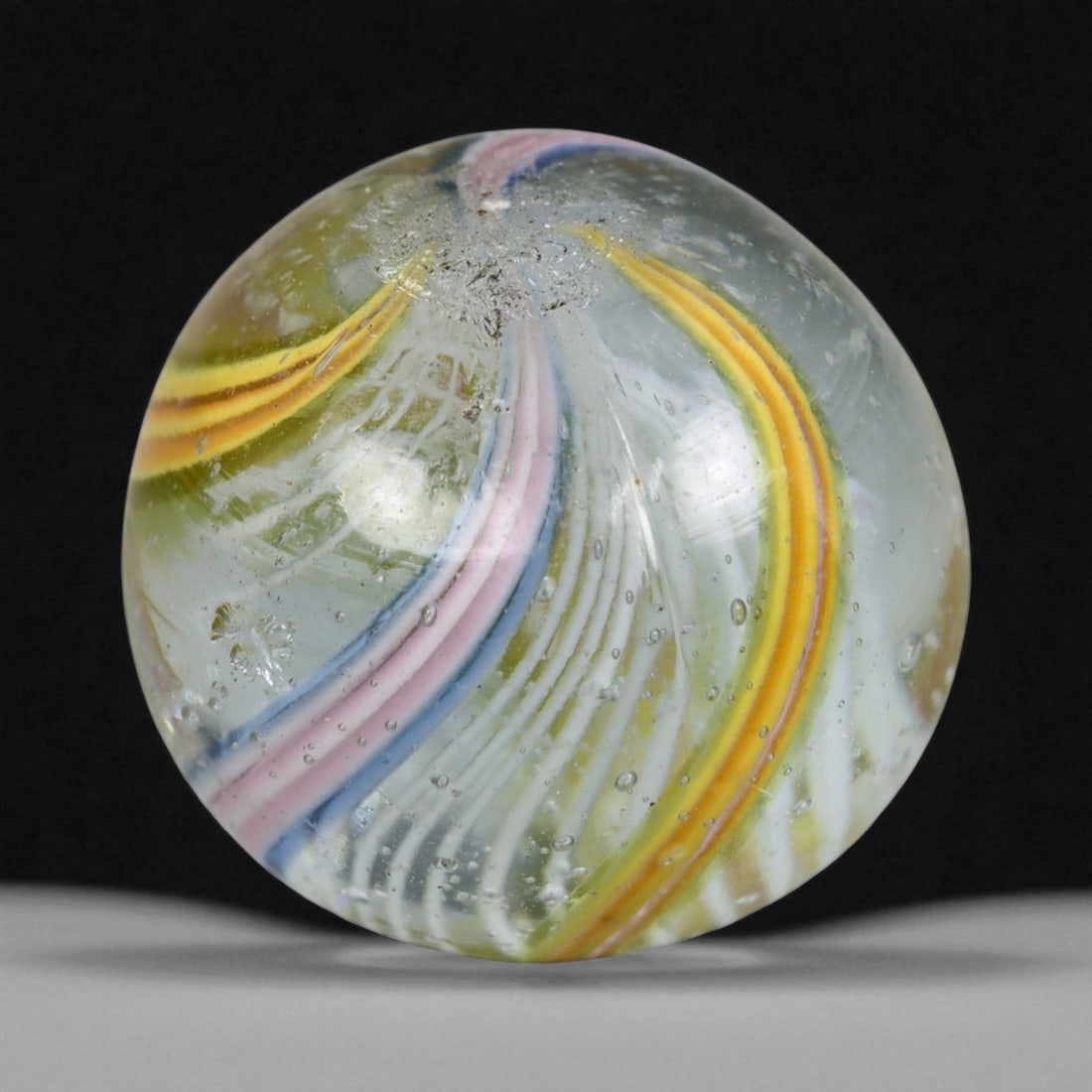Vintage German Handmade Glass Swirl Marble, c. Early-Mid 20th Century, 16 mm: This vintage German handmade glass marble represents the golden era of European glass artistry, where precision craftsmanship and vibrant color blending elevated even simple play objects into collecti