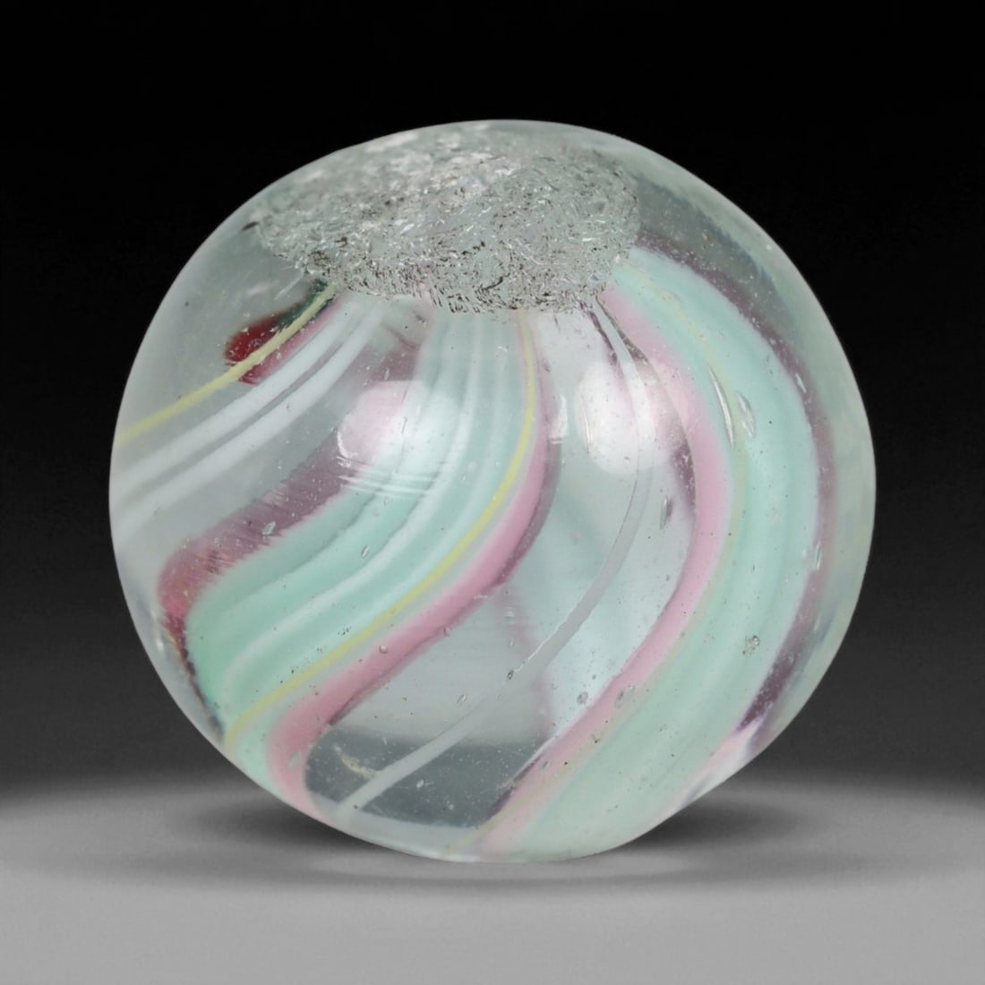 Vintage German Handmade Glass Swirl Marble, c. Early-Mid 20th Century, 15 mm: This vintage German handmade glass marble represents the golden era of European glass artistry, where precision craftsmanship and vibrant color blending elevated even simple play objects into collecti