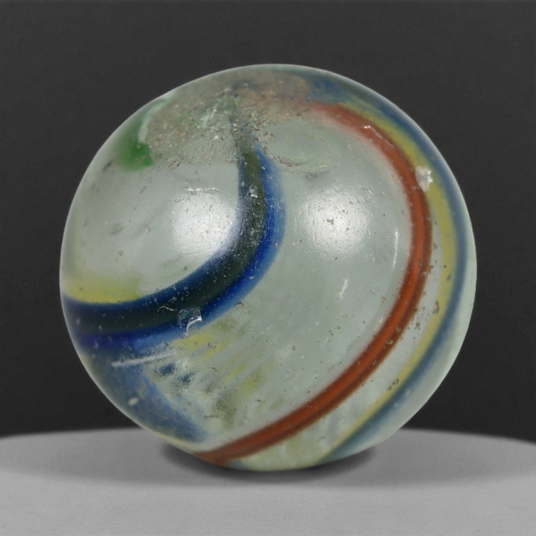 Vintage German Handmade Glass Swirl Marble, c. Early-Mid 20th Century, 15 mm: This vintage German handmade glass marble represents the golden era of European glass artistry, where precision craftsmanship and vibrant color blending elevated even simple play objects into collecti