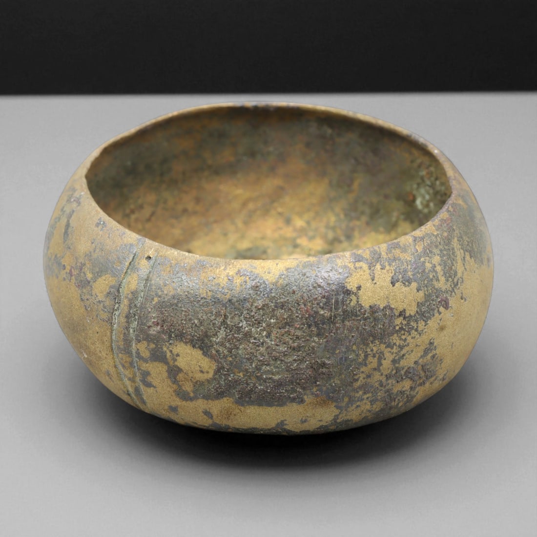Ancient Achaemenid Domed Bronze Bracelet, c. 6th-4th Century BCE, 8cm: This ancient bronze bracelet originates from the Achaemenid Empire, circa 6th-4th century BCE, reflecting the refined metal artistry that flourished under Persian rule. Its broad, domed form and smoot