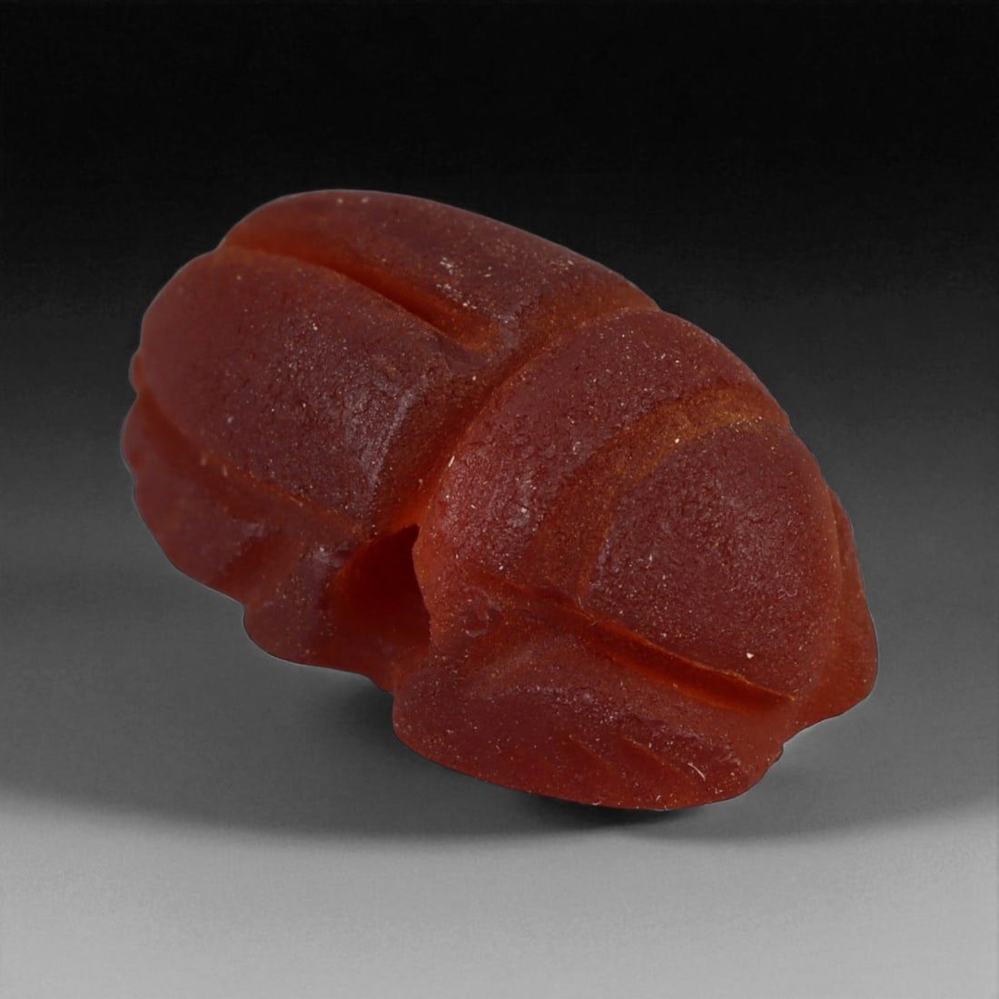 Ancient Egyptian Chalcedony Scarab Amulet, c. 18th-19th Dynasty, New Kingdom 18 mm: This beautifully carved chalcedony scarab amulet, dating to Egypt's New Kingdom period (circa 15th-13th centuries BCE), exemplifies the fusion of refined craftsmanship and sacred symbolism that define