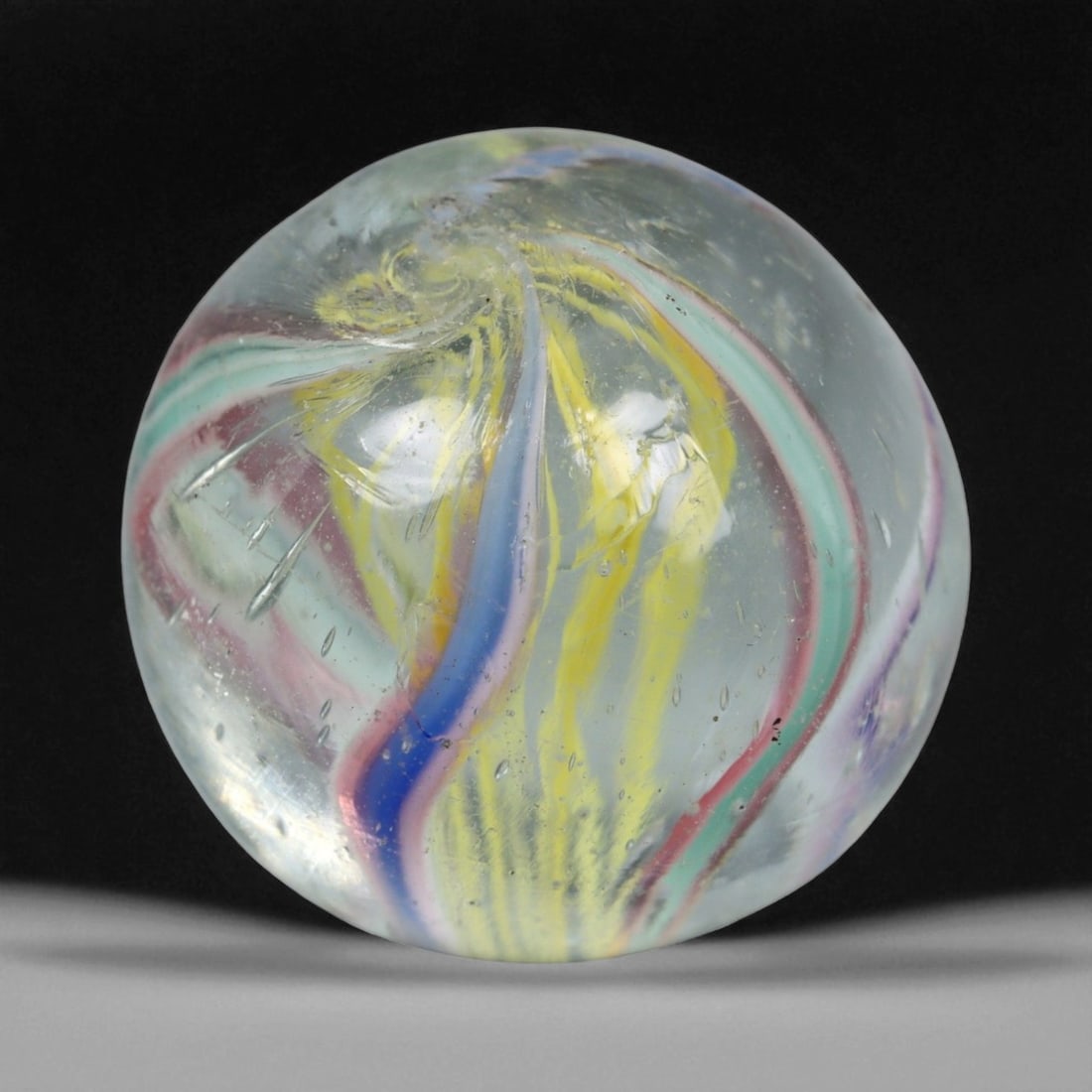 Vintage German Handmade Glass Swirl Marble, c. Early-Mid 20th Century, 16 mm: This vintage German handmade glass marble represents the golden era of European glass artistry, where precision craftsmanship and vibrant color blending elevated even simple play objects into collecti