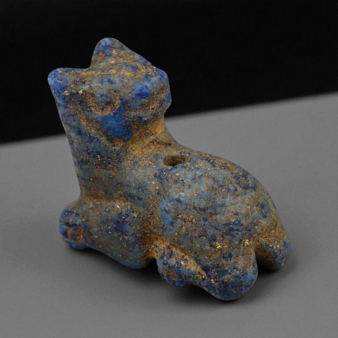 Ancient Egyptian Lapis Lazuli Recumbent Feline Amulet, c. 19th-21st Dynasty, New Kingdom 19mm (1 of 3)