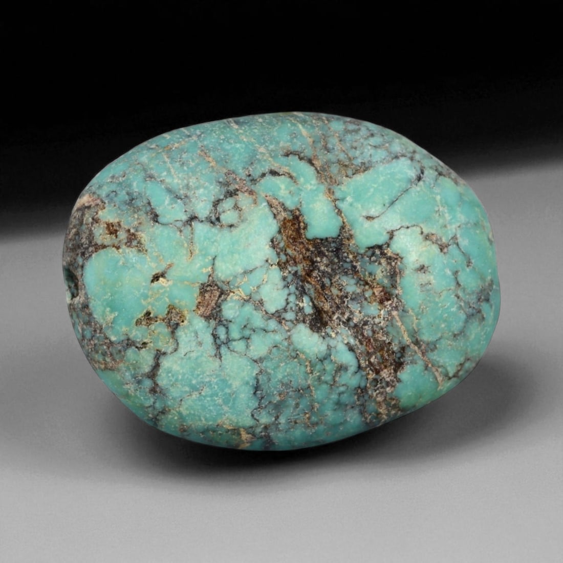 Antique Tibetan Mala Prayer Turquoise Amulet Bead, c. 18th-19th Century, 2cm, 3g: This striking turquoise bead from Tibet, dating to the 18th-19th century, embodies the deep spiritual and cultural reverence accorded to this precious stone in Himalayan tradition. Its organic, rounde