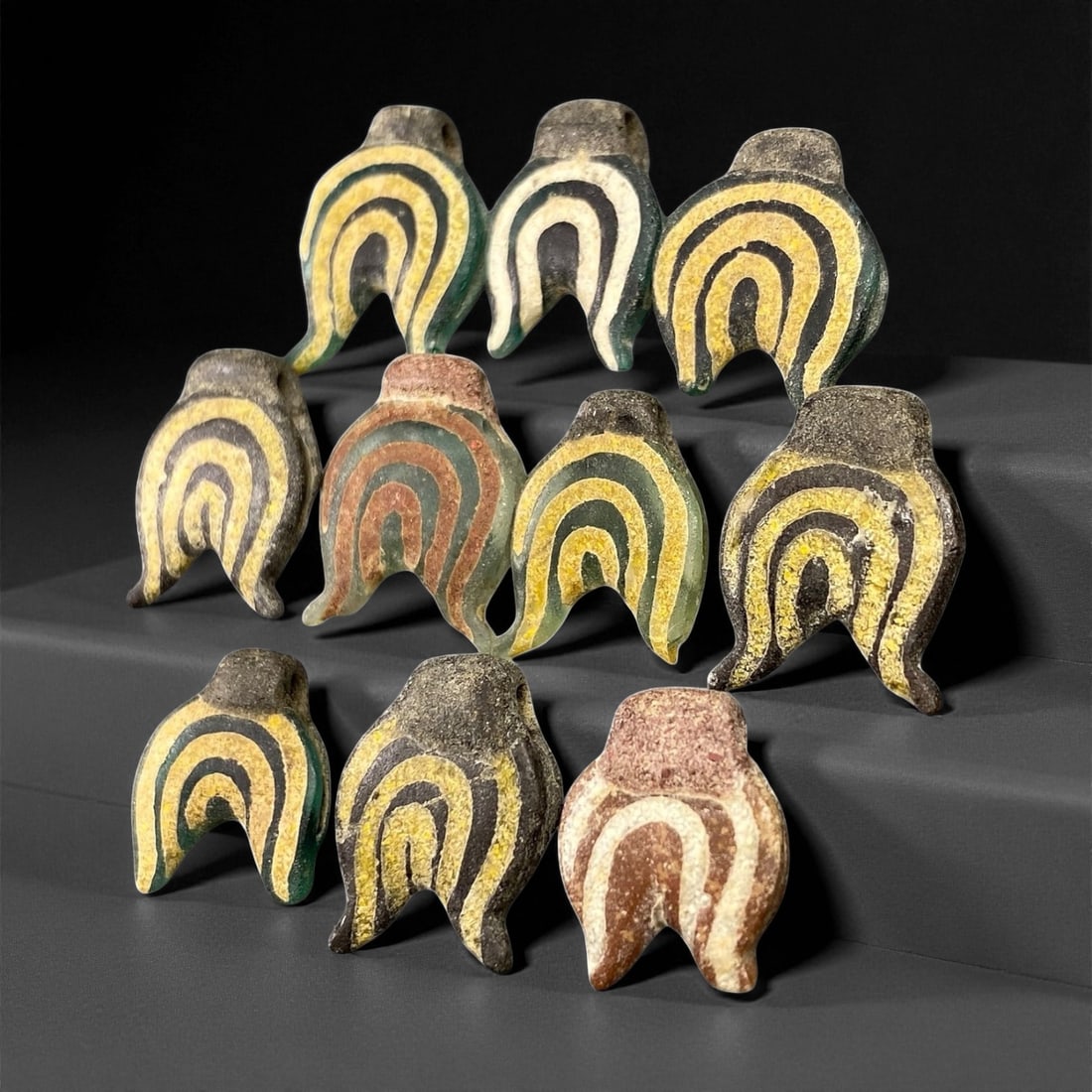Ancient Medieval Islamic Patterned Glass Beads, c. 12th-14th Century CE, 1.5-1.7cm: These exquisite medieval glass beads originate from the Islamic world between the 12th and 14th centuries CE, a period renowned for its vibrant glassmaking traditions spanning Persia, Syria, and Egypt
