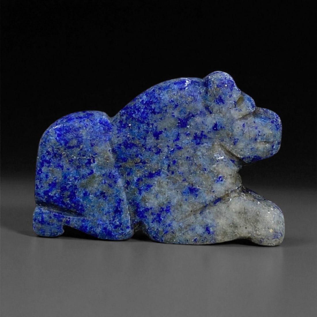 Ancient Bactrian Lapis Lazuli Lion Amulet, c. 2nd Millennium BCE, 3.5cm, 12g: This finely carved lapis lazuli amulet originates from ancient Bactria, circa 2nd millennium BCE, a civilization celebrated for its artistry and its central role in early Silk Road culture. The amulet