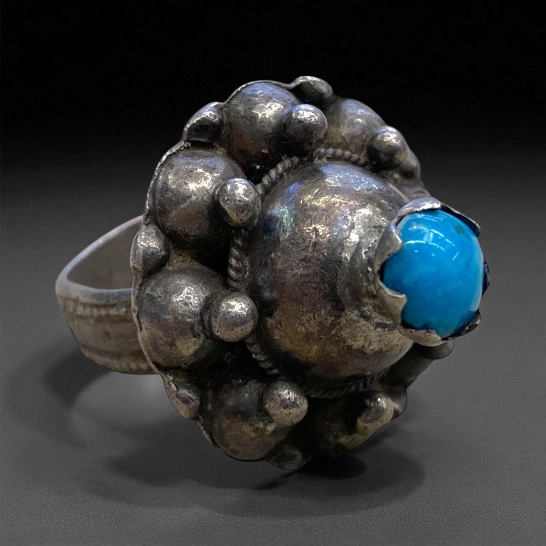 Antique Ottoman Silver and Turquoise Granulated Ring, c. 18th-19th Century, US 8 13g: This elegant antique ring exemplifies the opulent yet balanced artistry of late Ottoman silversmithing, where jewelry served not only as adornment but also as a vessel of symbolism and protection. The