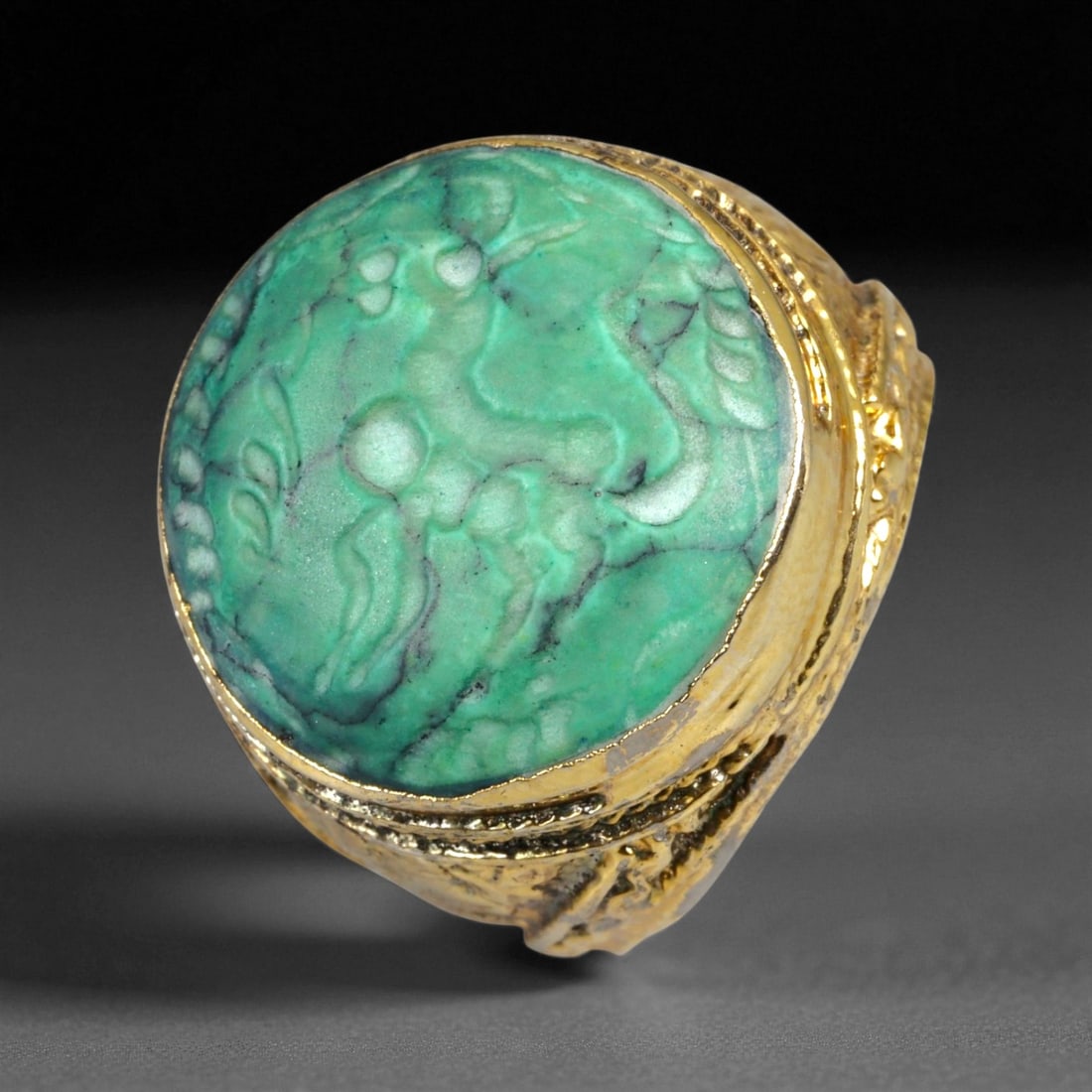 Antique Qajar Gold Gilt Intaglio Signet Ring, c. 19th-20th Century, 8 US, 18g: This substantial gilt ring, dating to the Qajar era of the 19th-20th century, embodies the regal aesthetic and cultural refinement of Persian jewelry traditions. The bezel is set with an engraved inta