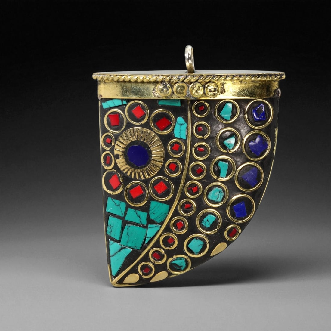 Vintage Himalayan Tribal Mosaic Turquoise Coral Lapis Brass Pendant, 20th Century, 5.5cm: This remarkable vintage Himalayan pendant captures the rich tradition of tribal brass craftsmanship from the high mountain regions of Nepal and Tibet. Fashioned from solid brass and set with vivid tur