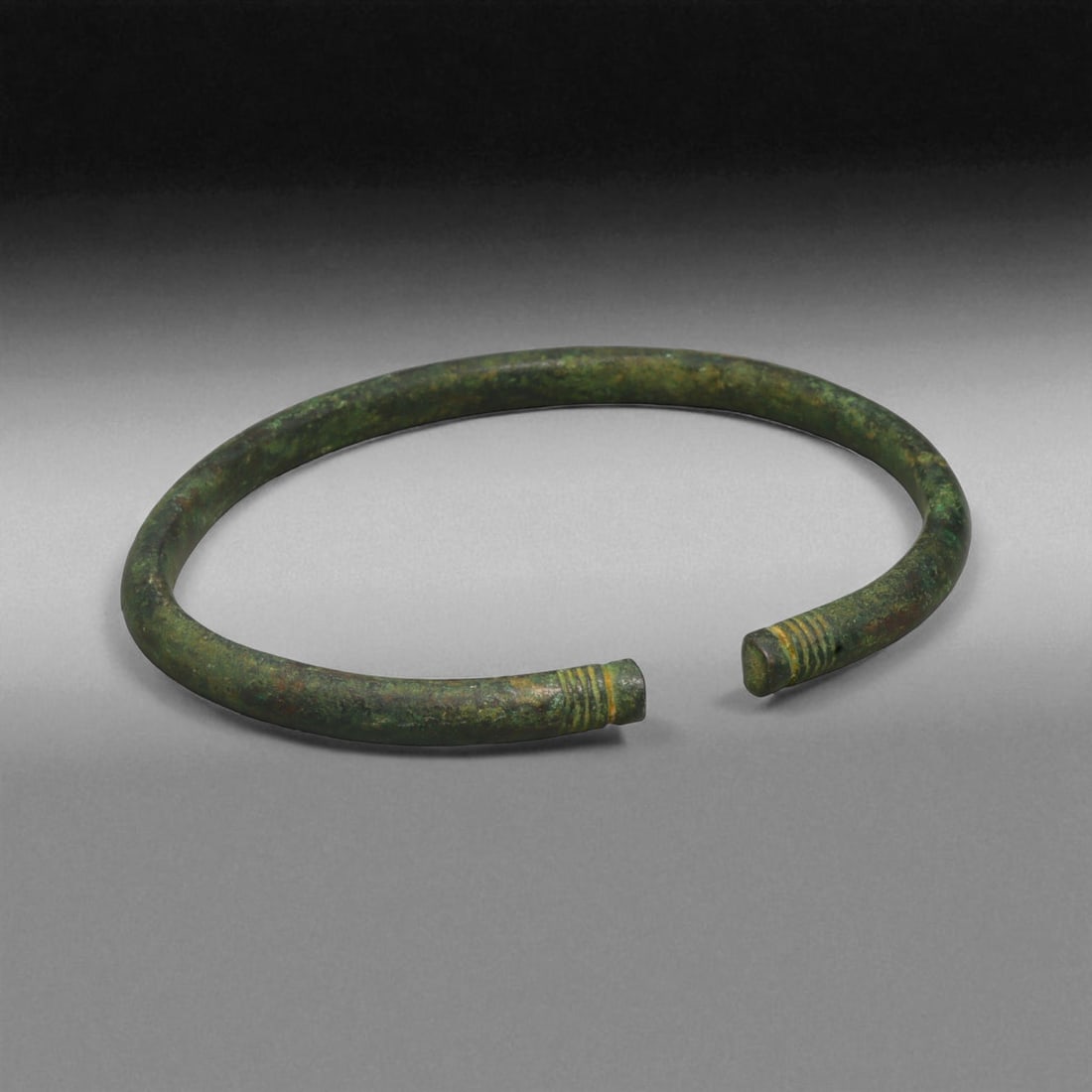 Ancient Roman Bronze Bracelet, c. 1st-3rd Century CE, 9cm, 59g: This ancient Roman bronze bracelet dates to the height of the Roman Empire, between the 1st and 3rd centuries CE, a time of expansive trade, engineering marvels, and refined metal craftsmanship. Bronz