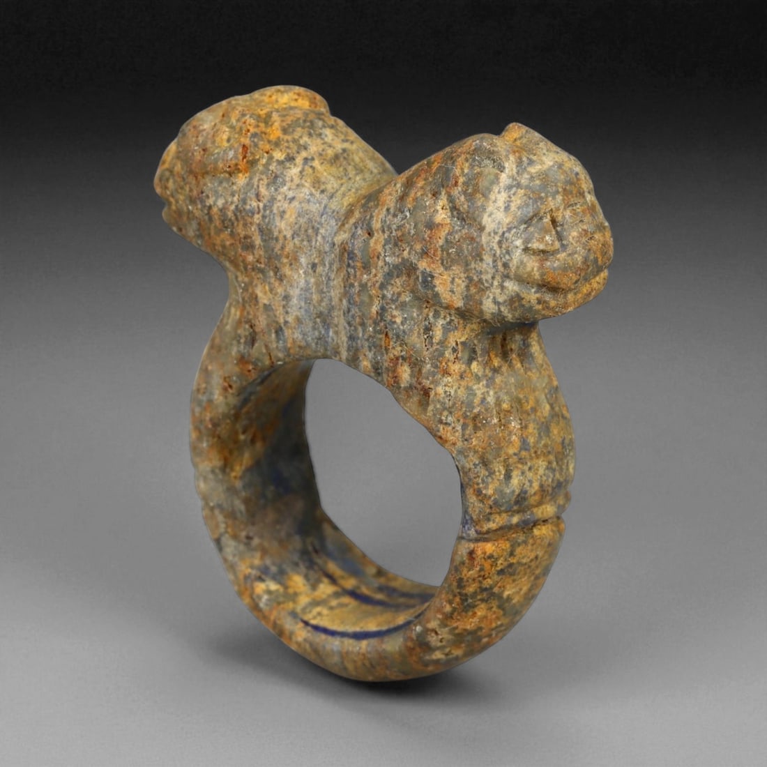 Ancient Parthian Double-Headed Feline Guardian Stone Ring, c. 2nd-3rd Century CE, 3.5cm: This striking stone ring comes from the Parthian Empire, a dynasty that held sway over Iran and Mesopotamia from 247 BCE to 224 CE. Parthian artisans drew upon a wide repertoire of symbolic motifs, of