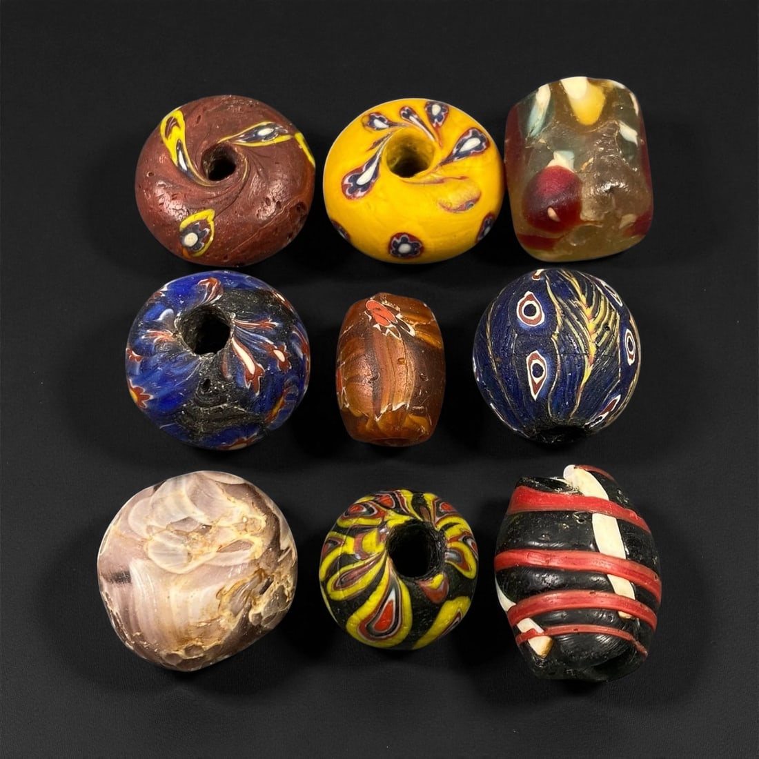 Antique Venetian Polychrome Millefiori and Chevron Glass Beads, c. 19th Century, 1.5-2.3cm: This lively assemblage of antique Venetian glass beads, dating from the 19th century, captures the exuberant color and artistry that made Murano glassmakers the undisputed masters of decorative beadwo