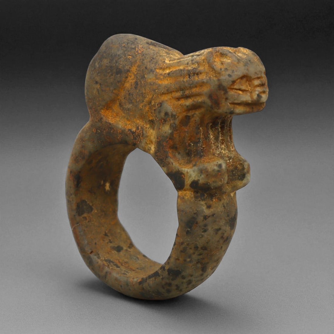 Ancient Parthian Lion-Form Steatite Ring, c. 2nd-1st Century BCE, 4.3 cm: This striking ring, carved from dense steatite and shaped into the form of a prowling lion, dates to the Parthian Empire-an era that bridged Hellenistic refinement and Persian grandeur. The Parthians,
