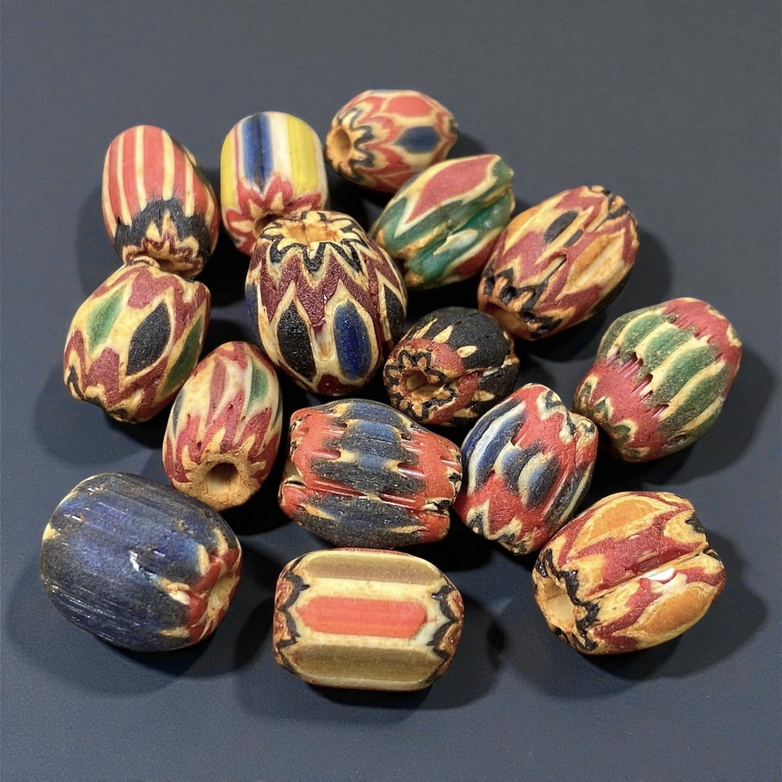 Antique Venetian Chevron Trade Beads, c. 19th Century, 1.2-1.4cm: This vibrant lot of antique Venetian chevron beads, dating to the 19th century, represents one of the most recognizable and sought-after forms of European glass artistry. Produced in Venice and Murano