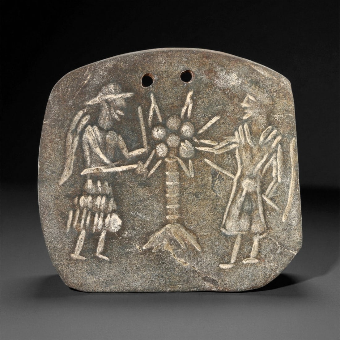 Ancient Neo-Sumerian Sacred Tree of Life Steatite Plaque Amulet, c. 21st-20th Century BCE, 7.6cm: This finely carved steatite plaque amulet originates from the Neo-Sumerian period, a flourishing age of art and theology centered in the cities of Ur and Lagash. Depicting two winged figures flanking 