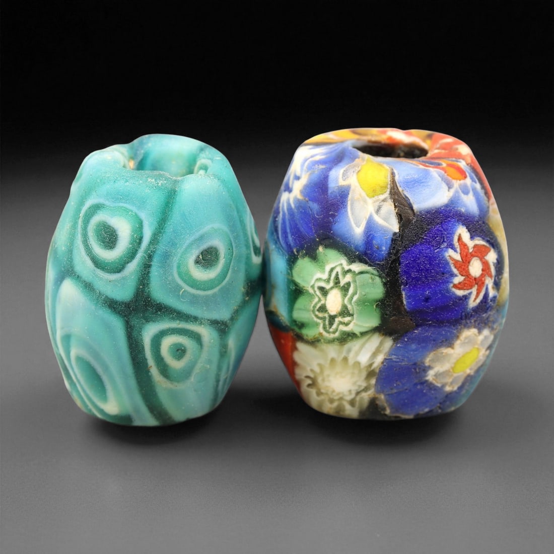 Antique Venetian Millefiori Glass Bead c. 19th Century 2.1cm: This antique Venetian millefiori bead embodies the vibrant artistry of 19th century Murano glassmakers, who perfected the fusing and shaping of multicolored canes into richly patterned mosaic designs.