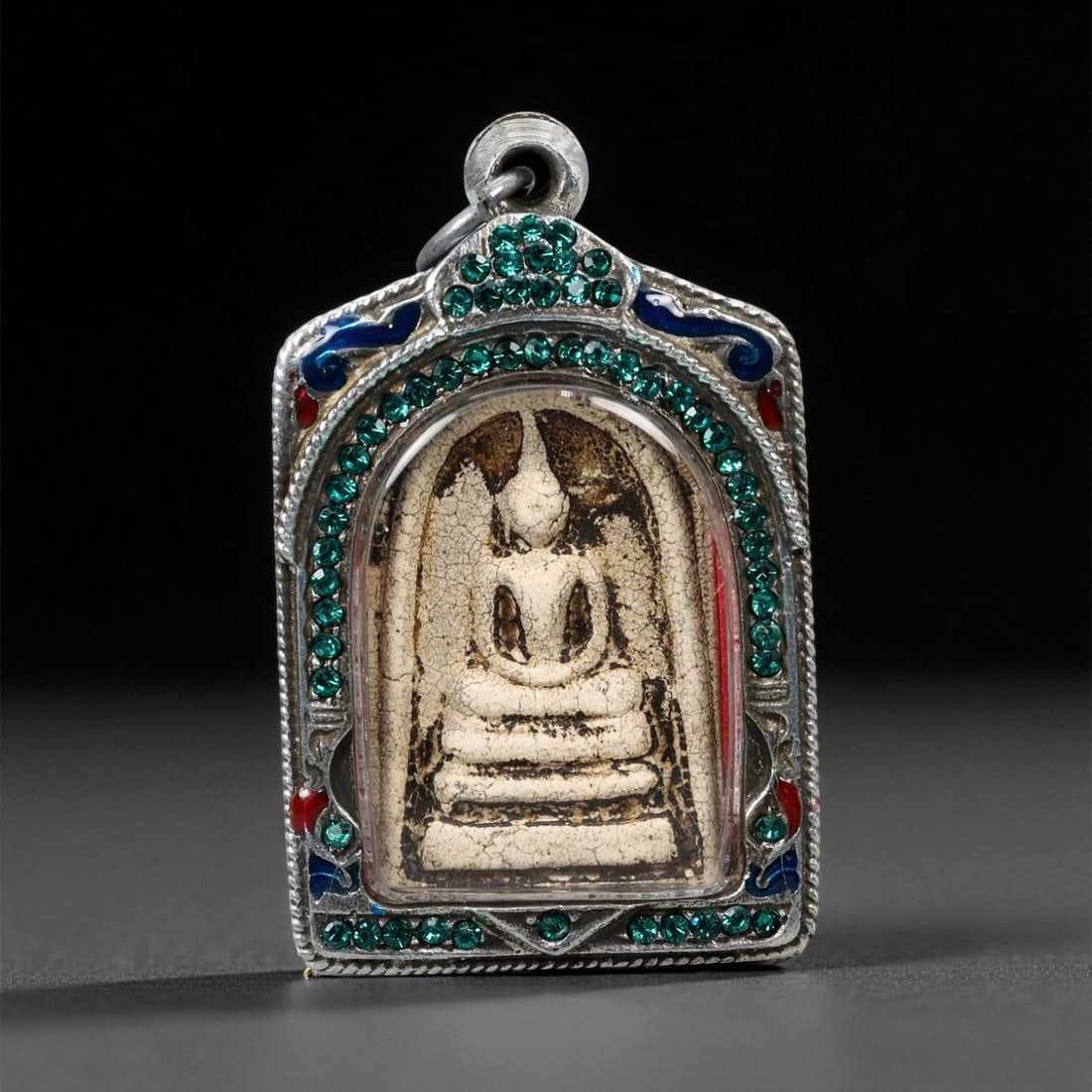 Vintage Thai Buddhist Amulet in Ornate Framed Setting, 20th Century , 6cm: This vintage Thai Buddhist amulet exemplifies the devotional artistry that continues to define Thailand's sacred craftsmanship. Encased within an intricately detailed frame, the amulet displays refine