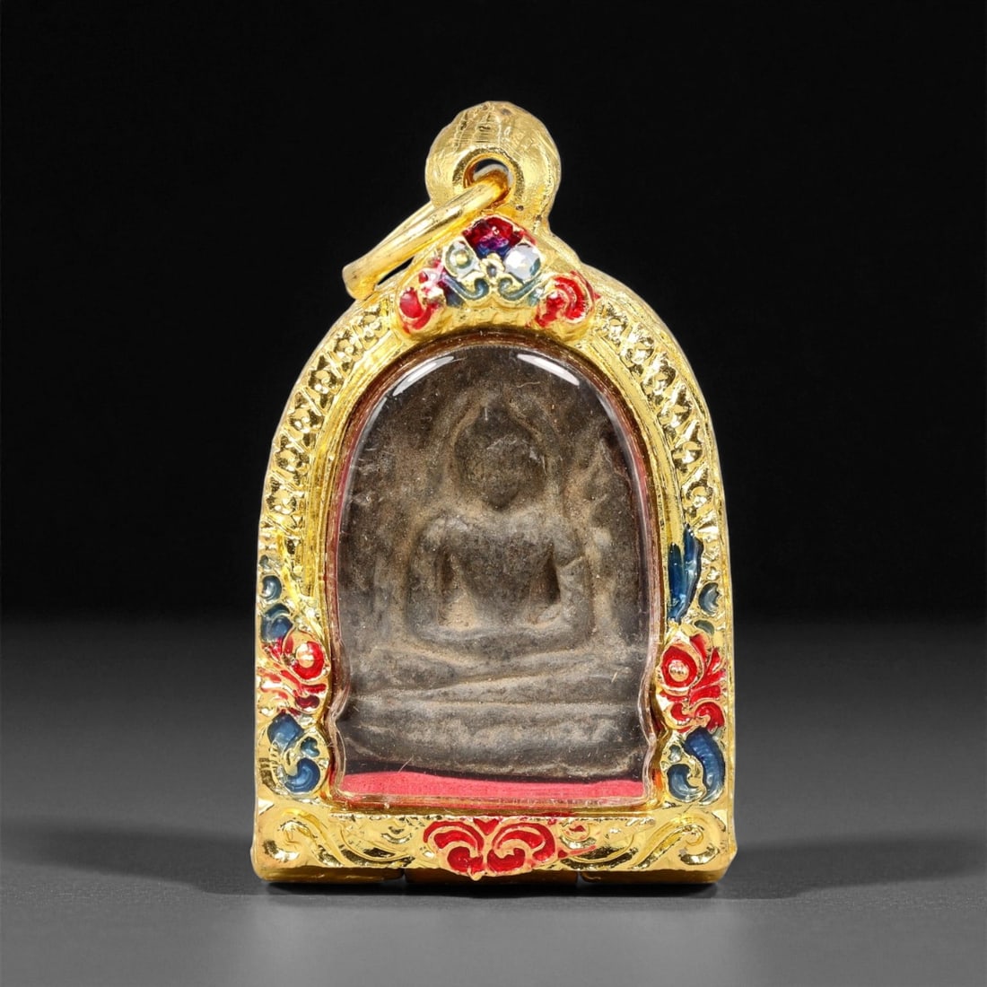 Gilt Buddhist Amulet in Ornate Gold-Tone Frame, Thai Temple Style , 4.5cm: This beautifully crafted gilt Buddhist amulet is enclosed within an intricately designed gold-tone frame, combining sacred symbolism with refined artistry. The detailed relief and lustrous finish refl