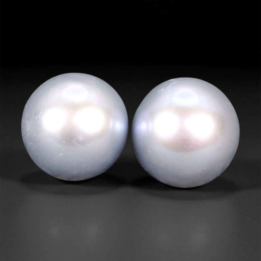 6.80 mm Silvery Blue Freshwater Pearl Pair - Natural Akoya-Inspired Luster: This graceful pair of freshwater pearls displays a silvery blue body color with faint rose overtones and a soft, glowing luster. Their rounded symmetry and subtle iridescence lend a refined, understat