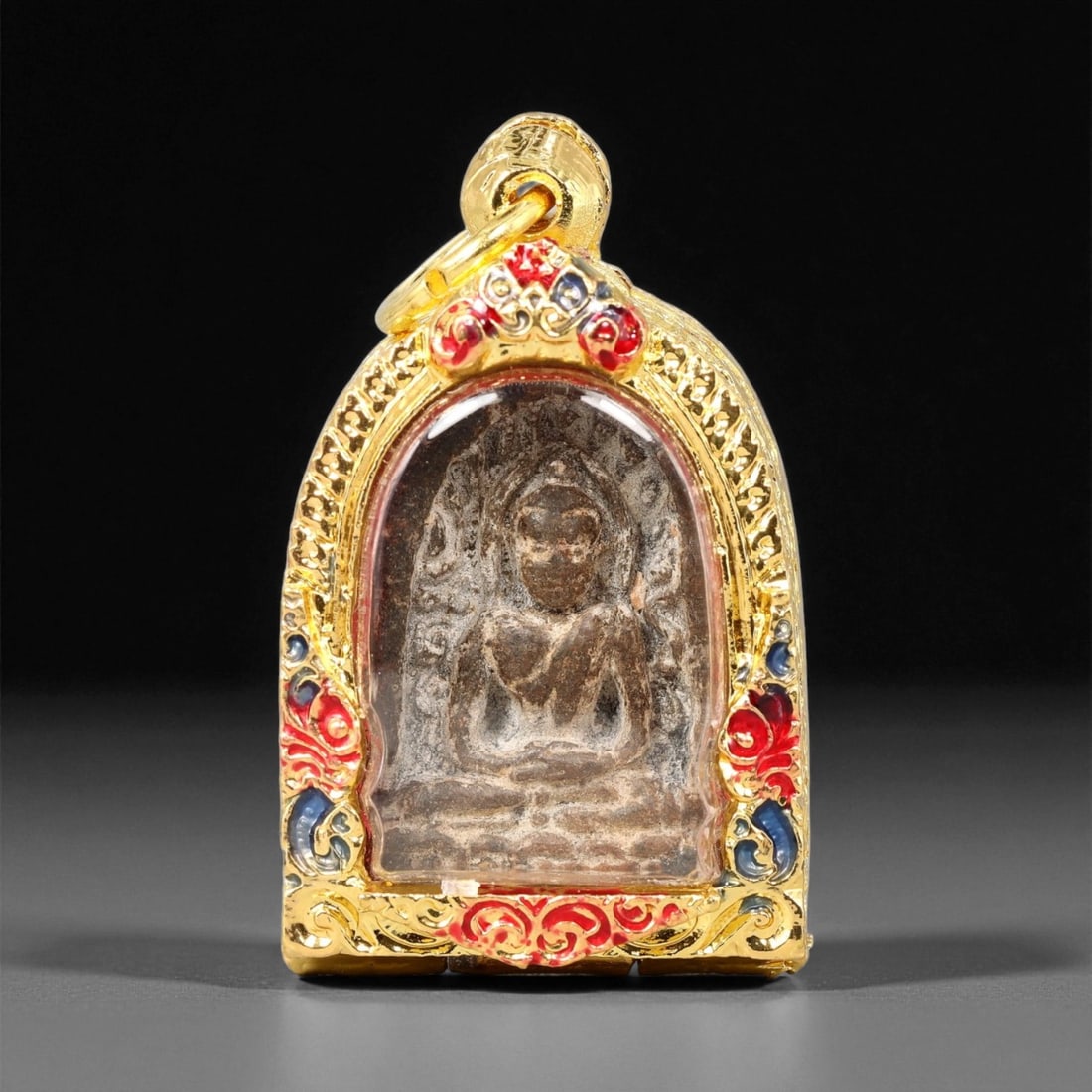 Gilt Buddhist Amulet in Ornate Gold-Tone Frame, Thai Temple Style , 4.5cm: This beautifully crafted gilt Buddhist amulet is enclosed within an intricately designed gold-tone frame, combining sacred symbolism with refined artistry. The detailed relief and lustrous finish refl