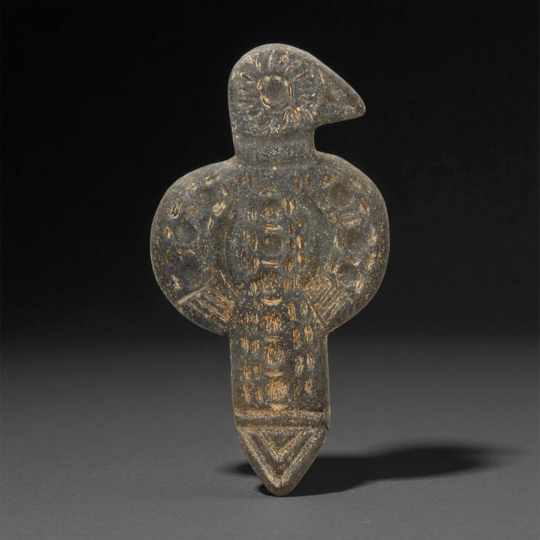 Ancient Bactrian Vulture Motif Schist Plaque, c. 2nd-1st Millennium BCE 10cm, 1EX: Carved from dark schist, this ancient plaque reflects the symbolic artistry of the Bactrian cultural sphere, a region spanning modern northern Afghanistan and parts of Central Asia. Bactrian craftsmen