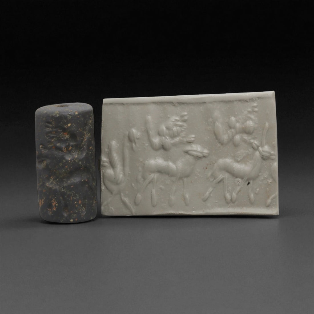 Ancient Mesopotamian Administrative Cylinder Seal, c. 2nd-1st Millennium BCE, 2.8cm, 99BC: This authentic cylinder seal from ancient Mesopotamia dates to the 2nd to 1st millennium BCE, a time when the art of carving miniature narratives on stone reached remarkable levels of refinement. Seal