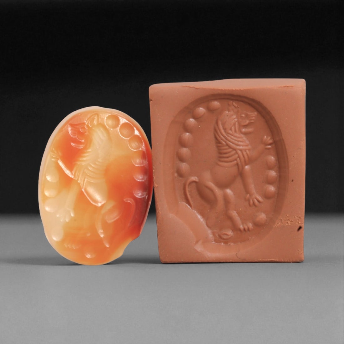 Ancient Sasanian Carnelian Intaglio with Engraving Motif, 2.3cm, 4g, 14BC: This carnelian intaglio, finely engraved into the warm red tones of semi-precious stone, reflects a tradition of craftsmanship spanning from the classical world to the early modern era. Intaglios serv