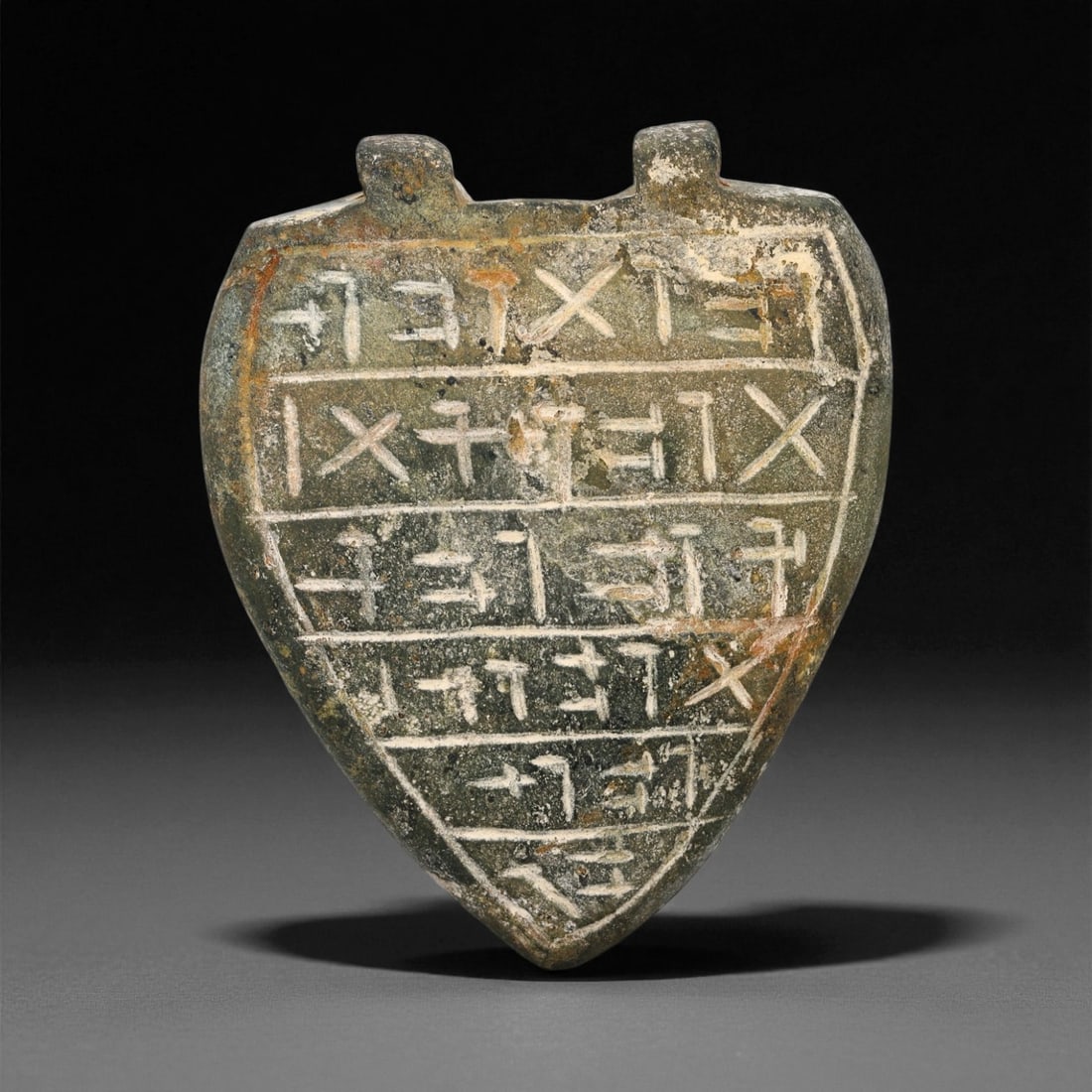 Ancient Mesopotamian Inscribed Serpentine Amulet, c. Neo-Assyrian Period, 5.9cm, 78ES: This finely inscribed serpentine amulet, dating to the Neo-Assyrian period (circa 9th-7th century BCE), exemplifies the spiritual sophistication and artistic precision of Mesopotamian protective magic