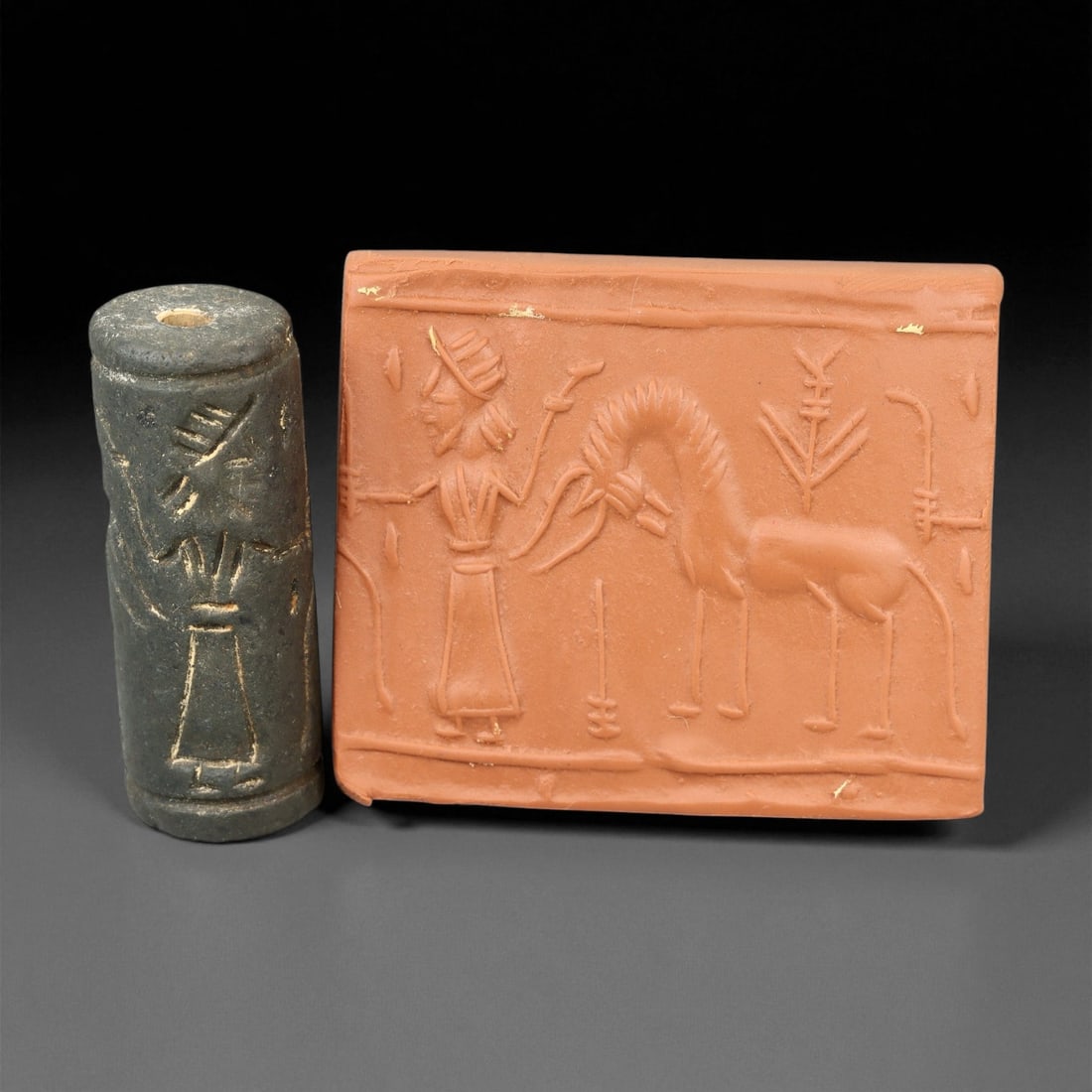 Ancient Mesopotamian Cylinder Seal of Divine Favor, c. 2nd-1st Millennium BCE, 4.5cm, 18EG: A striking relic from the dawn of civilization, this ancient Mesopotamian cylinder seal dates to the 2nd-1st millennium BCE - a period when art, writing, and ritual became inseparable expressions of c