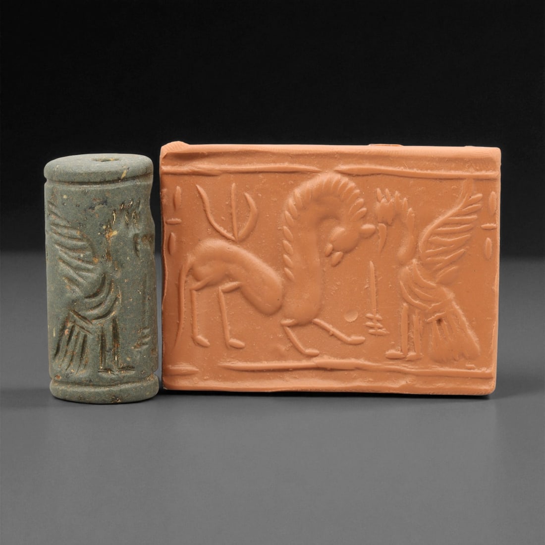 Ancient Mesopotamian Akkadian Steatite Cylinder Seal, c. 2300-2100 BCE, 4.2cm, 24EV: Carved from fine dark steatite, this ancient Akkadian cylinder seal dates to the late 3rd millennium BCE, a period when Mesopotamian artisans perfected the art of miniature relief engraving. Each seal