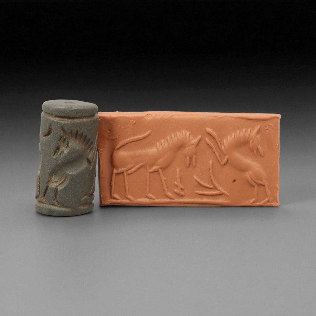 Ancient Mesopotamian Ritual and Administrative Cylinder Seal, c. 2000-1000 BCE, 3.5cm, 54K: A striking relic from the dawn of civilization, this ancient Mesopotamian cylinder seal dates to the 2nd-1st millennium BCE - a period when art, writing, and ritual became inseparable expressions of c