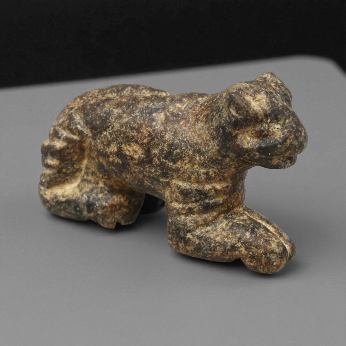 Ancient Bactrian Steatite Zoomorphic Bead, c. 2nd-1st Millennium BCE, 3.2cm, 61BF: This finely carved zoomorphic bead from ancient Bactria, dating to the 2nd-1st millennium BCE, exemplifies the region's early mastery of symbolic animal representation. Fashioned from dark steatite wi