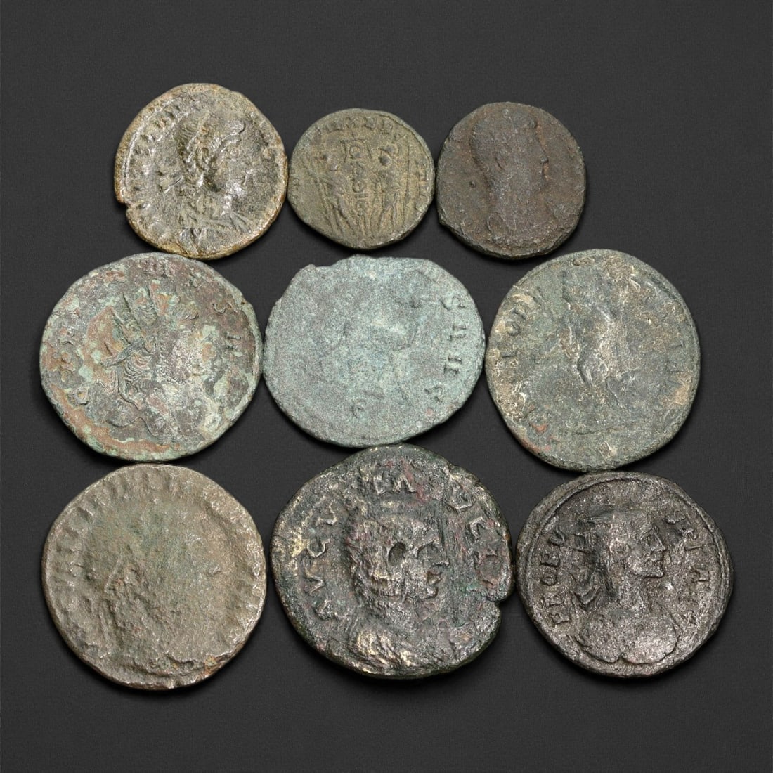 Ancient Roman Imperial Bronze Coins (AE2-AE3 Denominations), c. 3rd-4th Century CE, 44ER: A well-preserved group of nine bronze coins dating from the late Roman Imperial era, spanning approximately the 3rd to 4th century CE. These AE2-AE3 denominations represent a dynamic period of transit