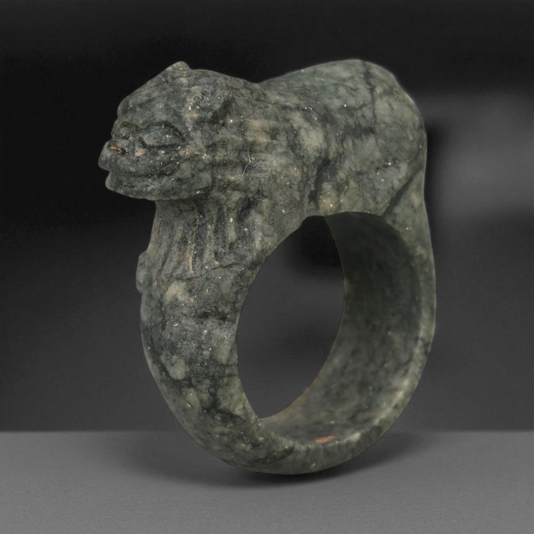 Ancient Parthian Feline Guardian Carved Stone Ring, c. 2nd-3rd Century CE, 3.5cm, 94BW: This impressive carved stone ring originates from the Parthian Empire, a dynasty that thrived in Iran from 247 BCE to 224 CE. The Parthians were known for their synthesis of Hellenistic, Persian, and