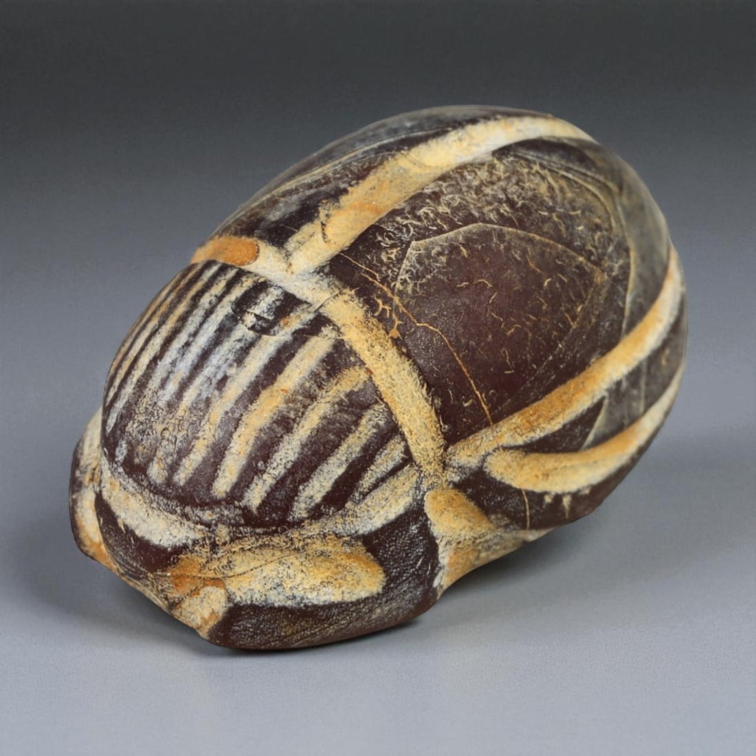Ancient Egyptian Banded Agate Scarab Amulet, c. New Kingdom 16th-11th Century BCE (2.1 cm), 51A: This beautifully carved scarab amulet, fashioned from rich banded agate, dates to Egypt's New Kingdom period-a time when scarabs served as enduring emblems of protection, transformation, and rebirth. 