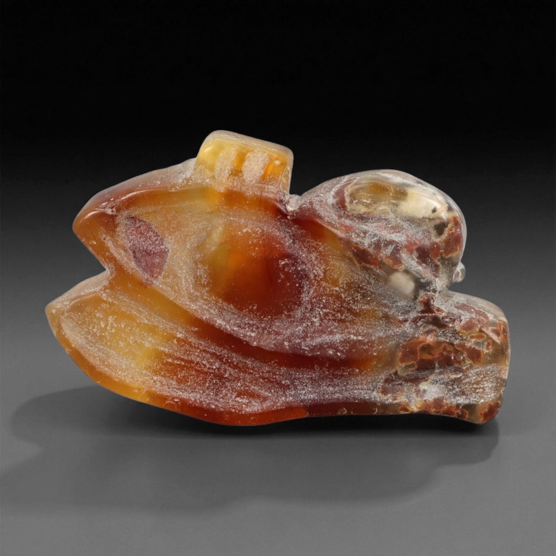 A Egyptian Carnelian Wadjet Eye (Eye of Horus) Amulet, New Kingdom, c. 1550-1070 BCE, 3.6cm, 46ER: Carved from rich orange-red carnelian, this striking amulet represents the Wadjet Eye, also known as the Eye of Horus-a sacred emblem of healing, protection, and divine balance. Dating to Egypt's New 