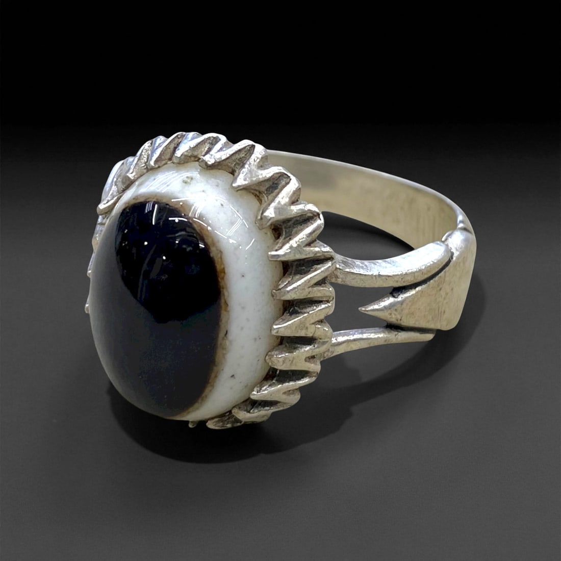 Antique Persian Banded Agate Silver Ring, c. Early 20th Century, US 12, 7.7g, 34CC: This striking antique Persian silver ring features a captivating natural banded agate with a deep black center framed by a milky white border-resembling the traditional "Eye Agate," long regarded in M