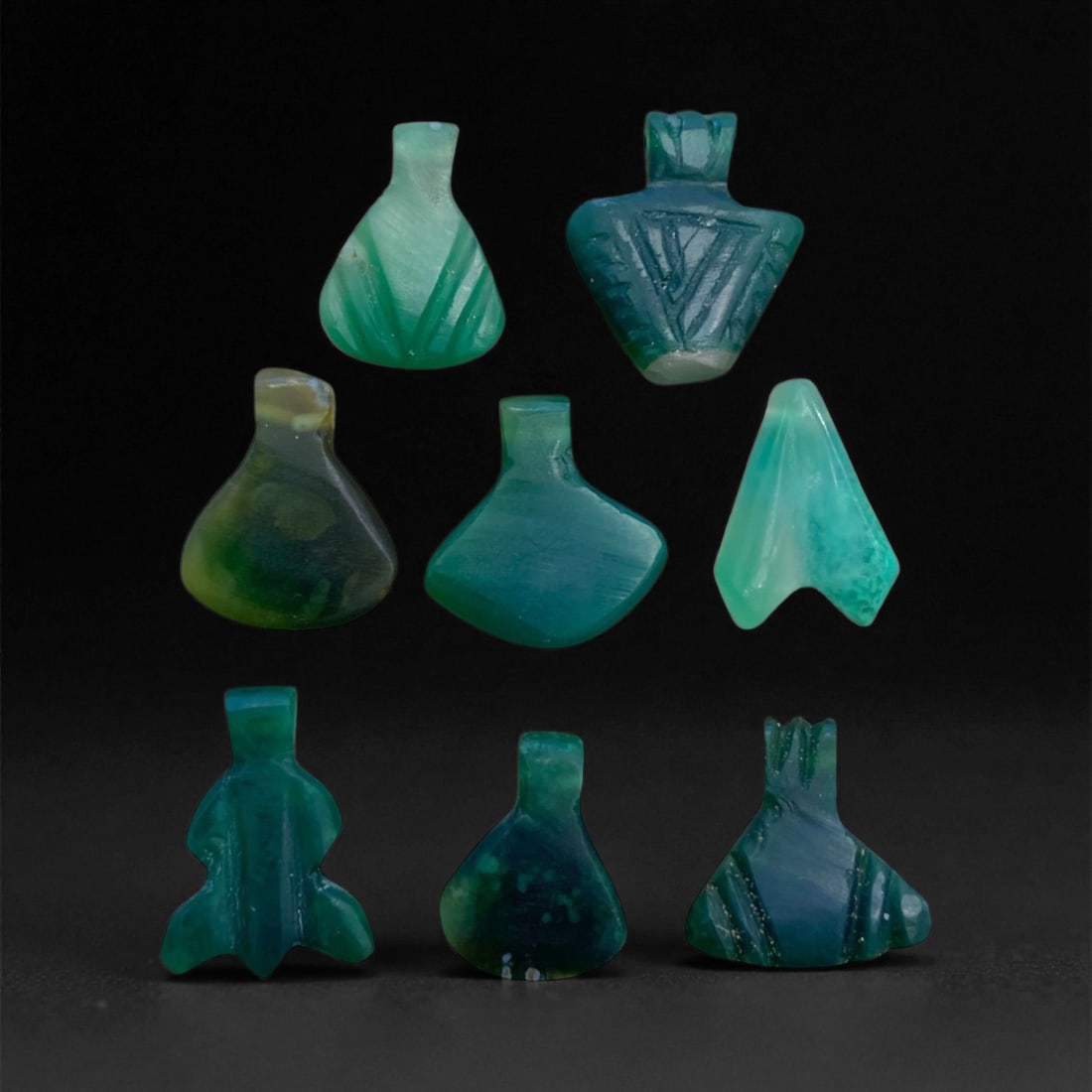 Ancient Coptic Egyptian Green Chalcedony Amulet, c. 5th-7th Century CE, 1.5-2 cm 11g, 97BB: This luminous ancient Coptic Egyptian amulet, carved from translucent green chalcedony, reflects the deep spiritual continuity between ancient Egyptian symbolism and early Christian Coptic faith. The 
