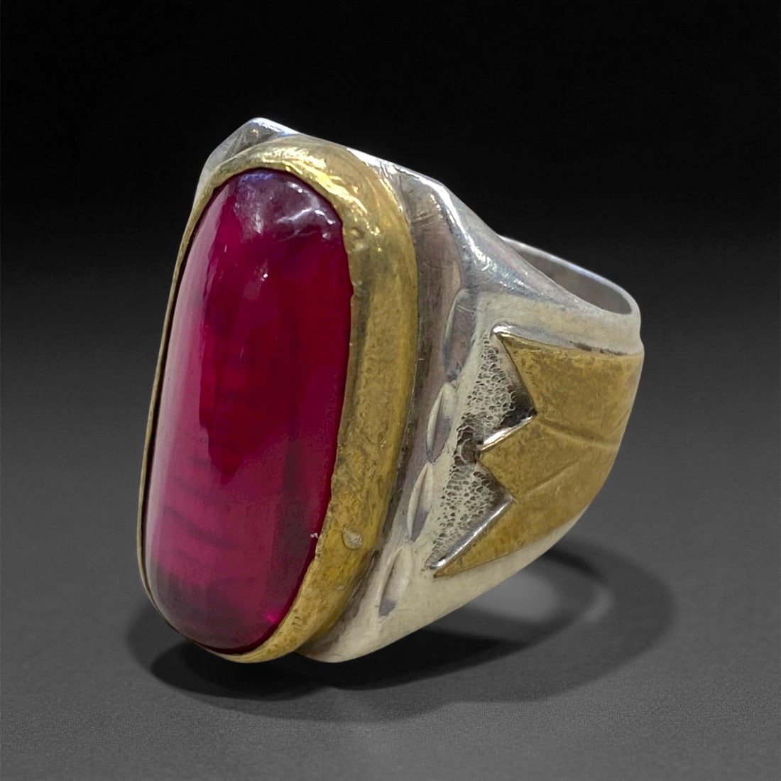 Antique Persian Gilded Ruby Glass Silver Ring, c. 19th-20th Century, US 7.5, 14g, 27CC: This distinguished antique Persian silver ring captures the grandeur of late Qajar to early Pahlavi craftsmanship, where ornamental richness and cultural symbolism intertwined seamlessly. Its centerpi