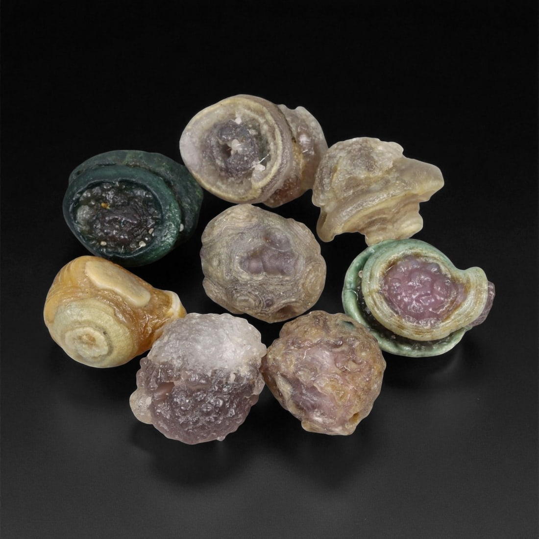Antique Sino-Mongolian Agate Beads, c. 18th-19th Century, 1.2-1.3cm, 6EP: These antique agate beads originate from the Sino-Mongolian cultural sphere, dating to the 18th-19th century. Each bead displays rich natural banding and subtle mineral variations in earthy hues of gr