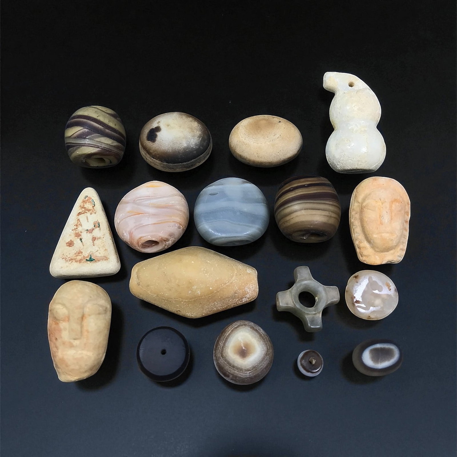 Antique Near Eastern Carved Agate and Stone Amulet Bead Set, c. 17th-19th Century, 0.6-3.6 cm, 37EW: This eclectic assemblage of antique beads and amulets reflects the long Near Eastern tradition of carving stone and agate into symbolic personal objects. Dating to the 17th-19th century, the pieces di