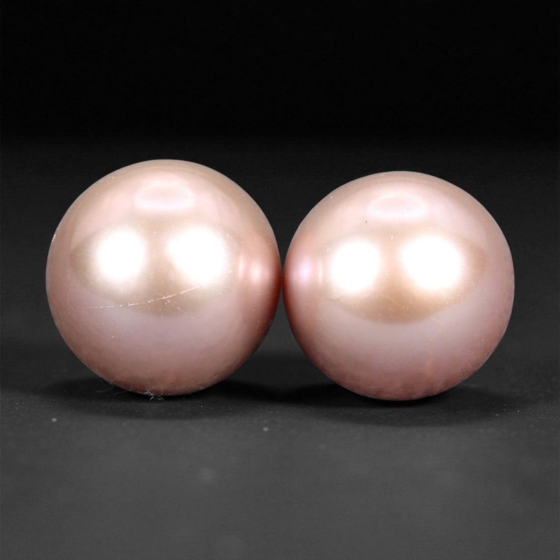 11.00 mm Blush Purplish Freshwater Pearl Pair - Natural Luster-Rich Spheres, 5XF: This exquisite pair of freshwater pearls glows with a soft blush body color touched by purplish overtones, offering a romantic hue rarely seen in natural pairs of this size and roundness. Their smooth