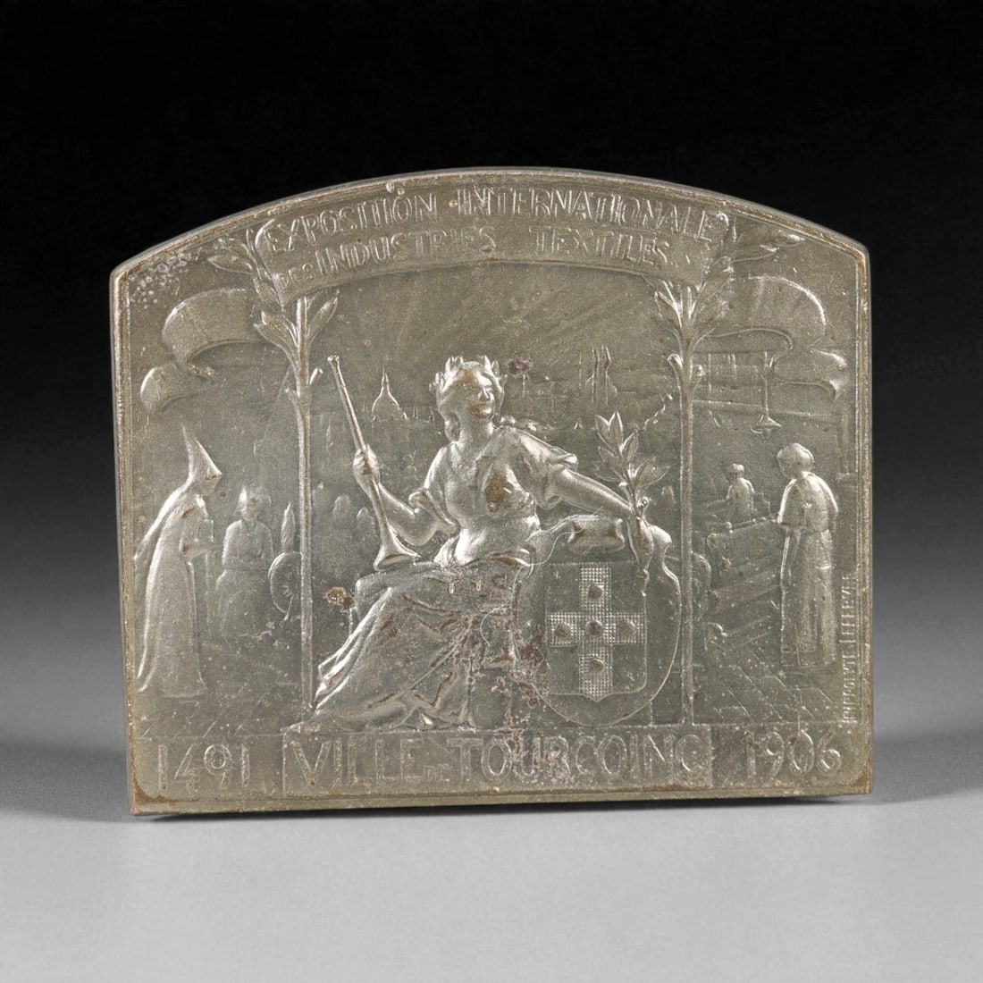 FRANCE: Industrial Commemoration - Textile Progress Plaque, 1906 Tourcoing, 50mm, 73R: Struck to honor the Exposition Internationale des Industries Textiles of 1906, this commanding rectangular plaque captures France's pride in its industrial ascendancy and cultural heritage. At its cen