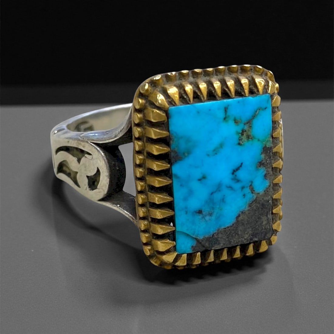 Antique Persian Turquoise Inlay Silver-Gilt Ring, c. Late 19th-Early 20th Century, Size 9, 8g, 36CC: This refined antique ring exemplifies the elegance of late Qajar-era Persian artistry, combining high craftsmanship with vivid color symbolism. The rectangular turquoise inlay, exhibiting striking sky