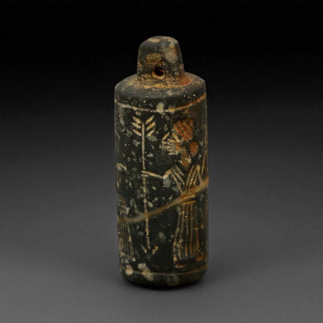A Mesopotamian Stone Cylinder Seal, 3rd-2nd Millennium BCE, 5.5cm, 5DQ: This authentic cylinder seal from ancient Mesopotamia dates to the 2nd to 1st millennium BCE, a time when the art of carving miniature narratives on stone reached remarkable levels of refinement. Seal