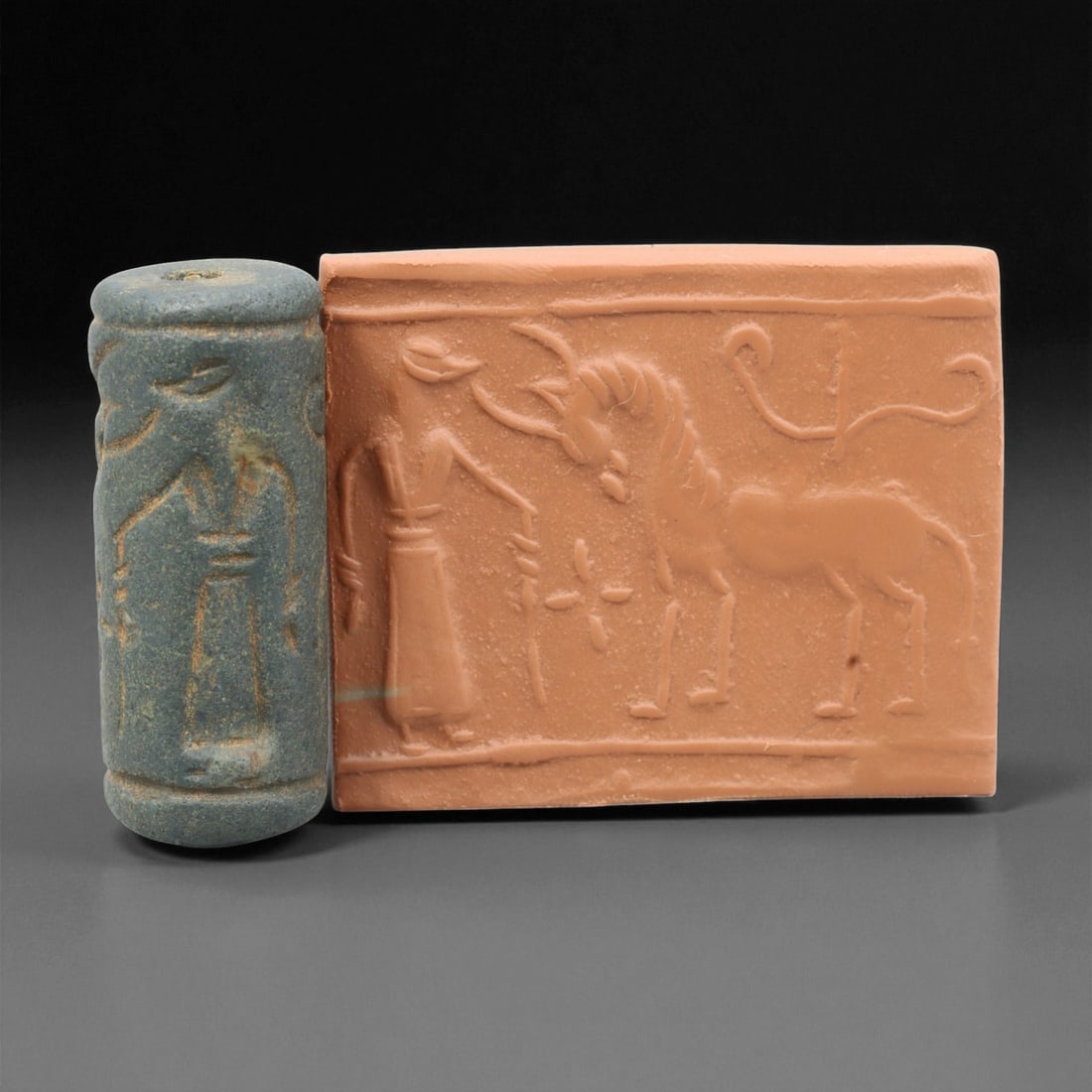 A Mesopotamian Stone Cylinder Seal, 3rd-2nd Millennium BCE, 4.2cm, 19EJ: This Mesopotamian cylinder seal dates to the 2nd-1st millennium BCE. Carved from stone, it would have been used to roll designs onto wet clay as a mark of ownership or identification. The seal fits co