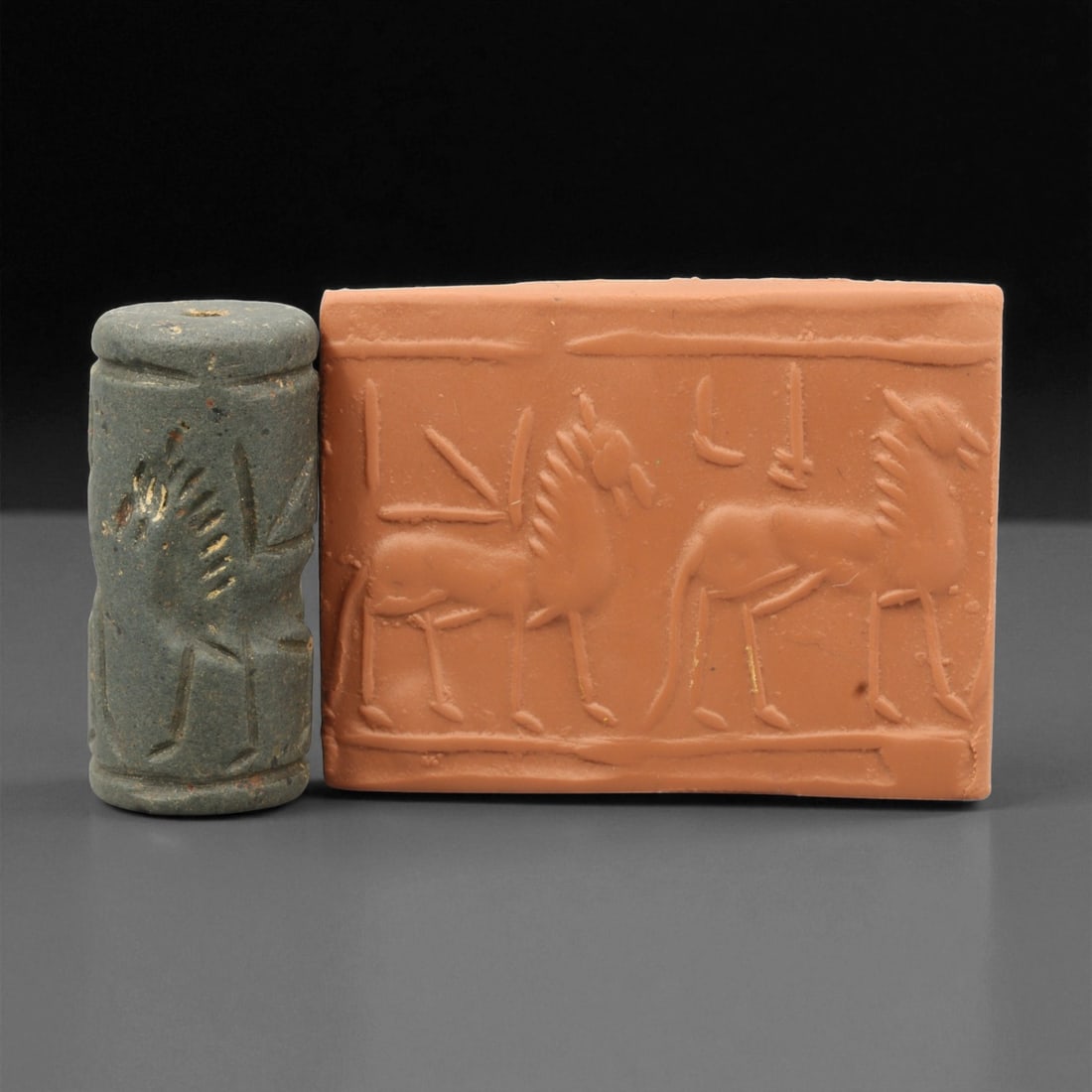 A Mesopotamian Stone Cylinder Seal, 3rd-2nd Millennium BCE, 3.6cm, 83EJ: This Mesopotamian cylinder seal dates to the 2nd-1st millennium BCE. Carved from stone, it would have been used to roll designs onto wet clay as a mark of ownership or identification. The seal fits co