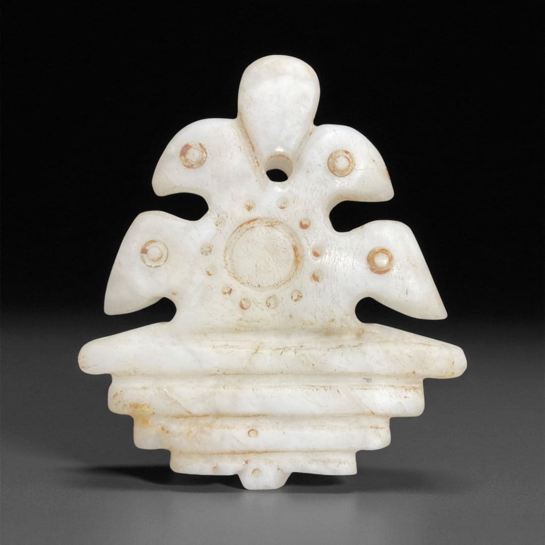 Ancient Persian Chalcedony-Jade Solar Crest Amulet, c. 800-500 BCE 8cm 74g, 8AA: This magnificent ancient amulet, carved from luminous white chalcedony-jade and weighing 74 grams, dates to the early Achaemenid or pre-Achaemenid Persian period, c. 800-500 BCE. A superb example of e
